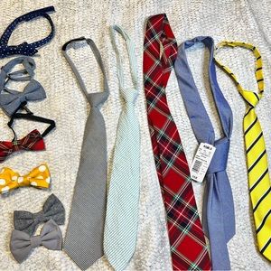 Young boys ties and bow ties from various places.